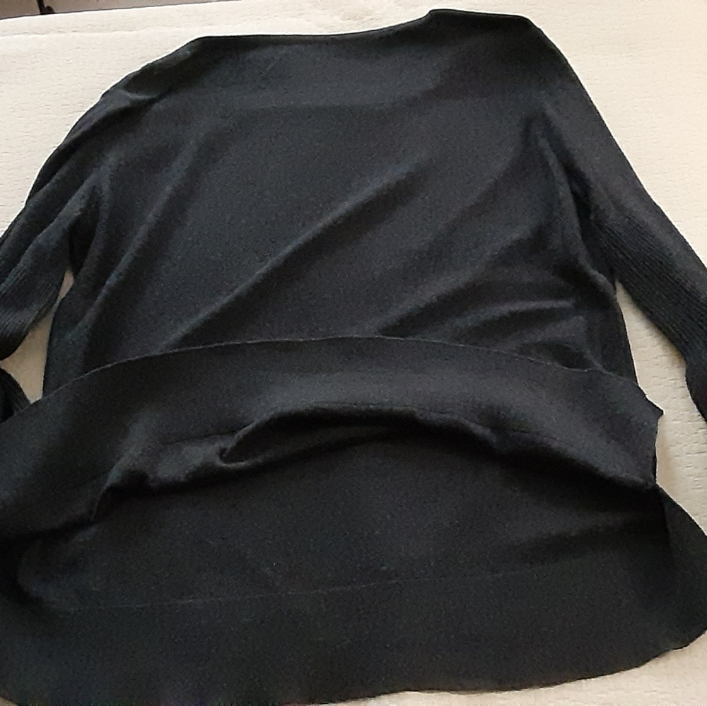 Dark gray sweater with flared sleeve